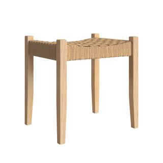 light tan wooden stool with a woven seat