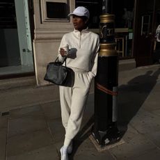 Marilyn wearing white loafers