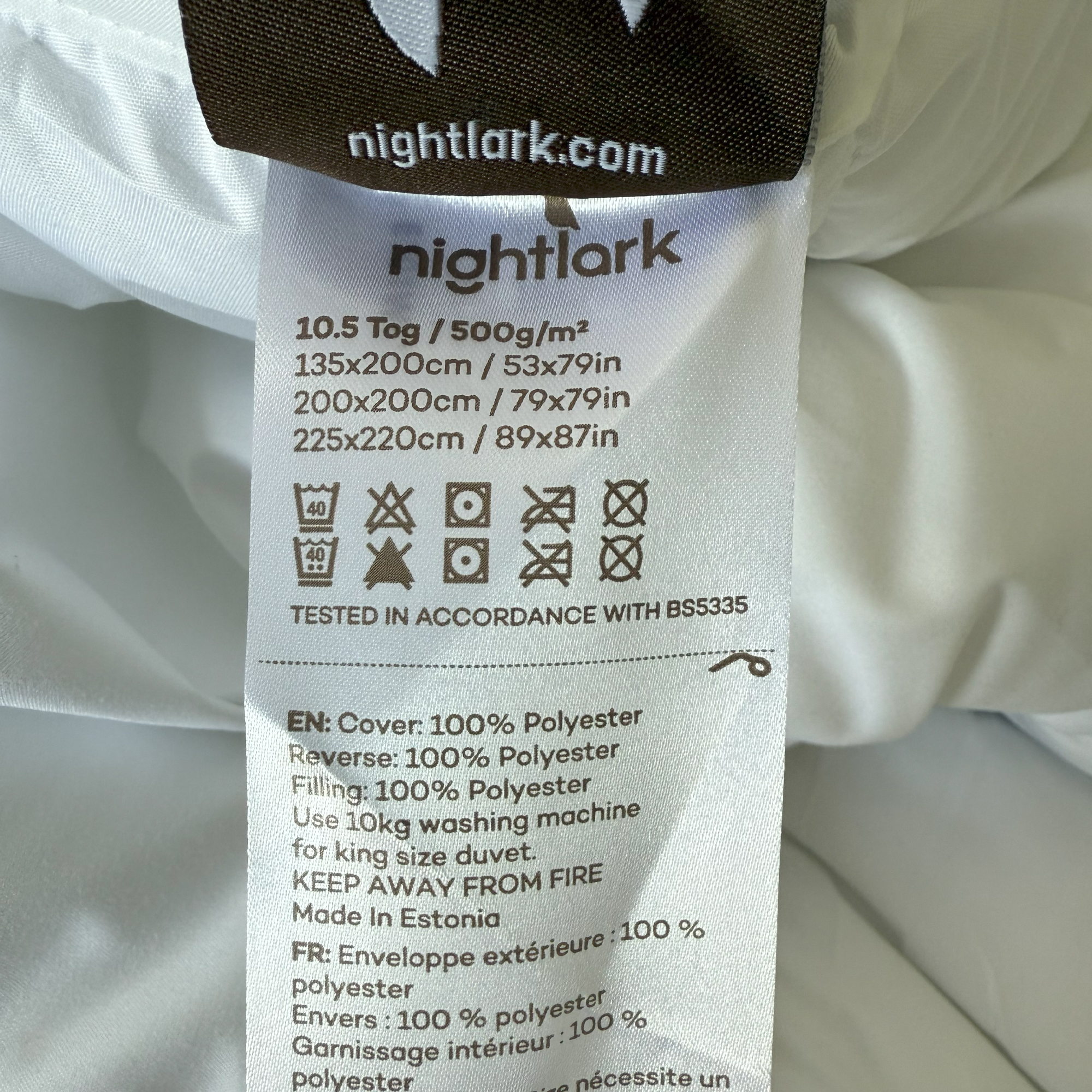 The blue gingham Night Lark Coverless Duvet being tested at home