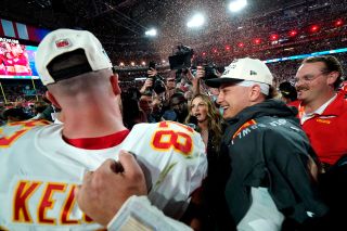 pSorts commentator Erin Andrews speaks to Kansas City Chiefs' tight end Travis Kelce (L) and Kansas City Chiefs' quarterback Patrick Mahomes (R) as they celebrate winning Super Bowl LVII against the Philadelphia Eagles at State Farm Stadium in Glendale, Arizona, on February 12, 2023.