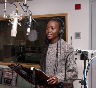 Academy Award-winning actress Lupita Nyong'o narrates the new space show "Worlds Beyond Earth." Here she can be seen recording in a studio.