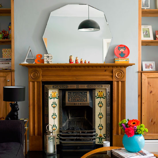 living room fireplace with alcove shelves coffee table