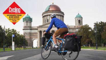 Image shows Stefan cycling on a bikepacking trip in Hungary.
