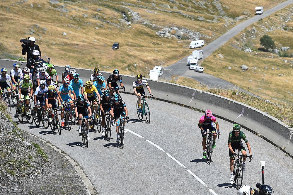 A lead group forms on the early slopes of the first climb.