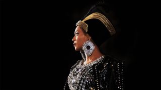 Beyonce in headdress during Coachella performance in Homecoming