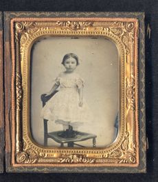 An old photo of an unidentified child. 