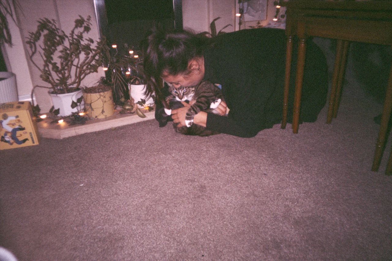 Grainy photo of house party during Christmas taken with the Flashback ONE35 redisposable digital camera