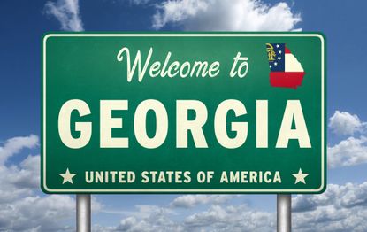 Welcome to Georgia sign on a blue sky background