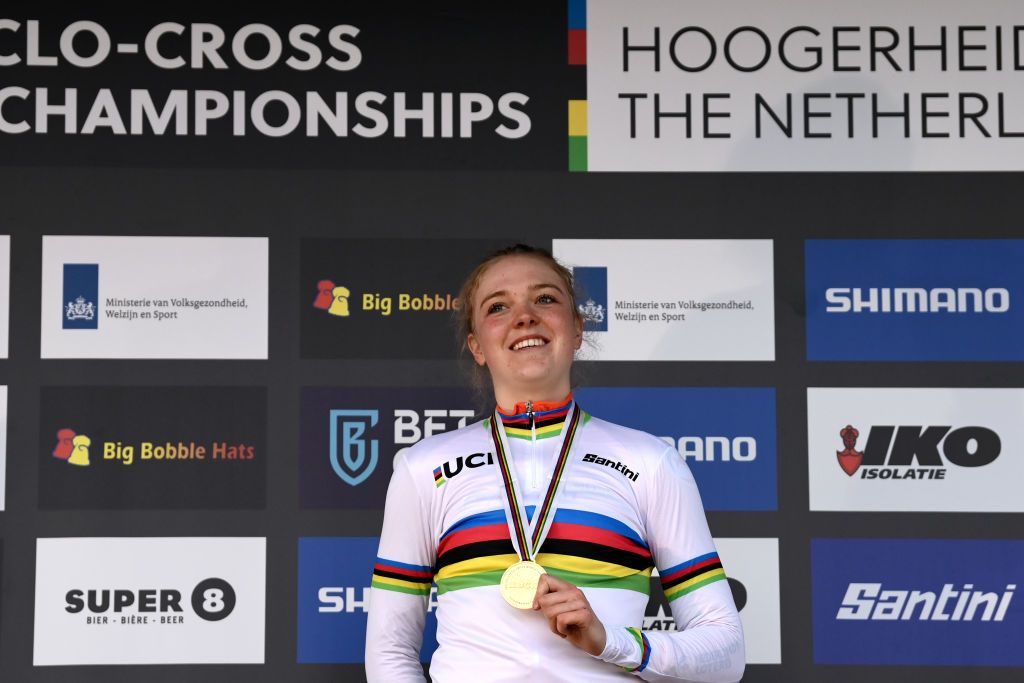HOOGERHEIDE NETHERLANDS FEBRUARY 04 Gold medalist Fem van Empel of The Netherlands celebrates winning during the medal ceremony after the 74th World Championships CycloCross 2023 Womens Elite CXWorldCup Hoogerheide2023 on February 04 2023 in Hoogerheide Netherlands Photo by David StockmanGetty Images