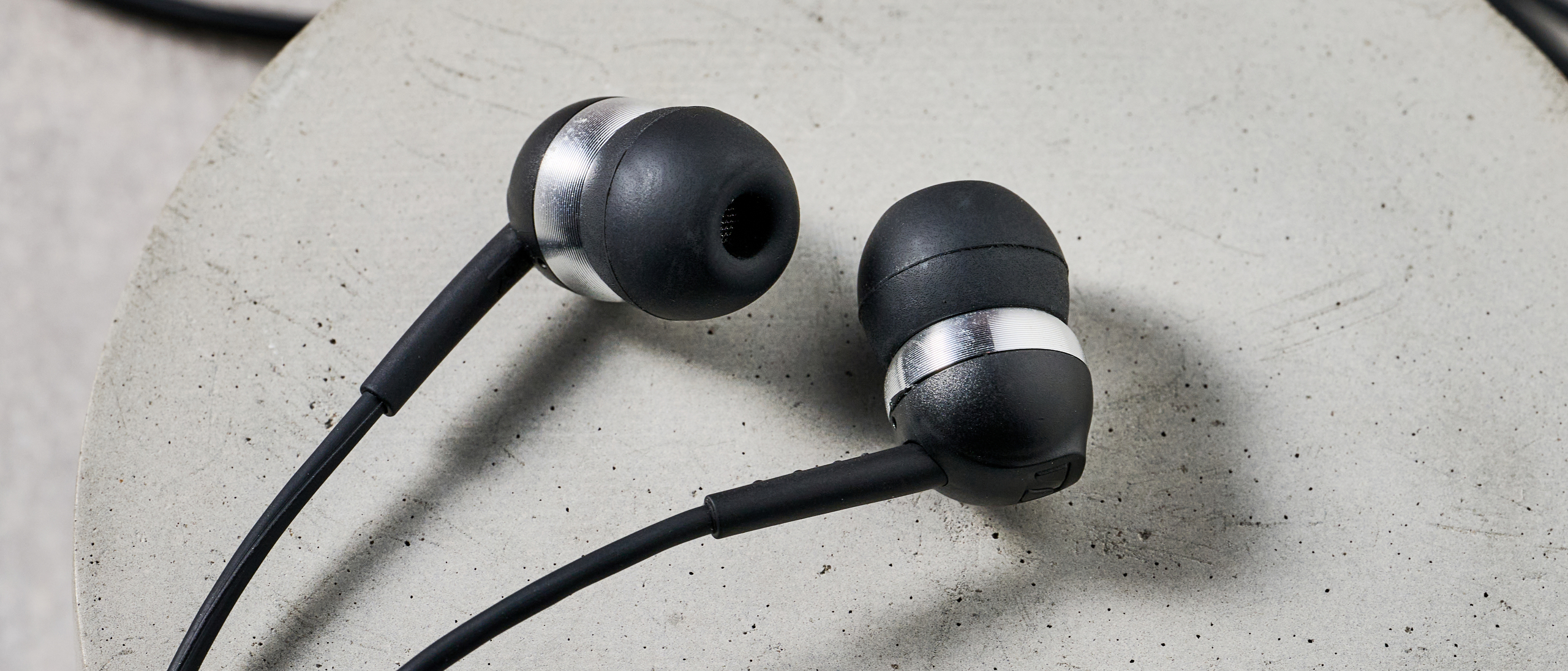 Sennheiser CX 80U earbuds on block