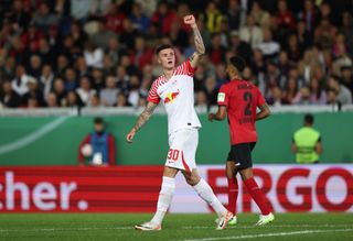 Benjamin Sesko of RB Leipzig celebrates after scoring his teams third goal during the DFB cup first round match between SV Wehen Wiesbaden and RB Leipzig at BRITA-Arena on September 27, 2023 in Wiesbaden, Germany. (Photo by Ralf Ibing - firo sportphoto/Getty Images) Chelsea target striker