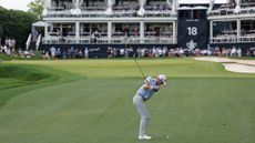 Ryan Gerard plays an iron shot into the 18th at the PGA Championship