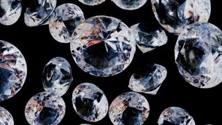 Close-up of costume diamonds in a black background.