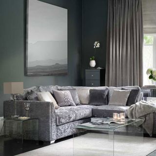 living room with grey walls and sofa set with cushions