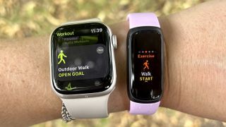 a photo of the Apple Watch Series 8 and the Fitbit Inspire 3