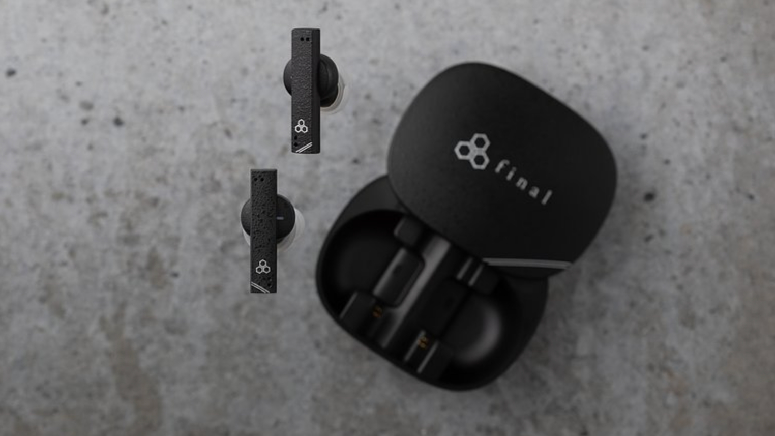 Final Audio ZE8000 MK2 earbuds and case on gray stone background