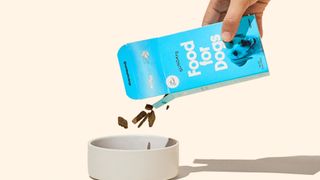 Sundays for Dogs food being poured into a bowl