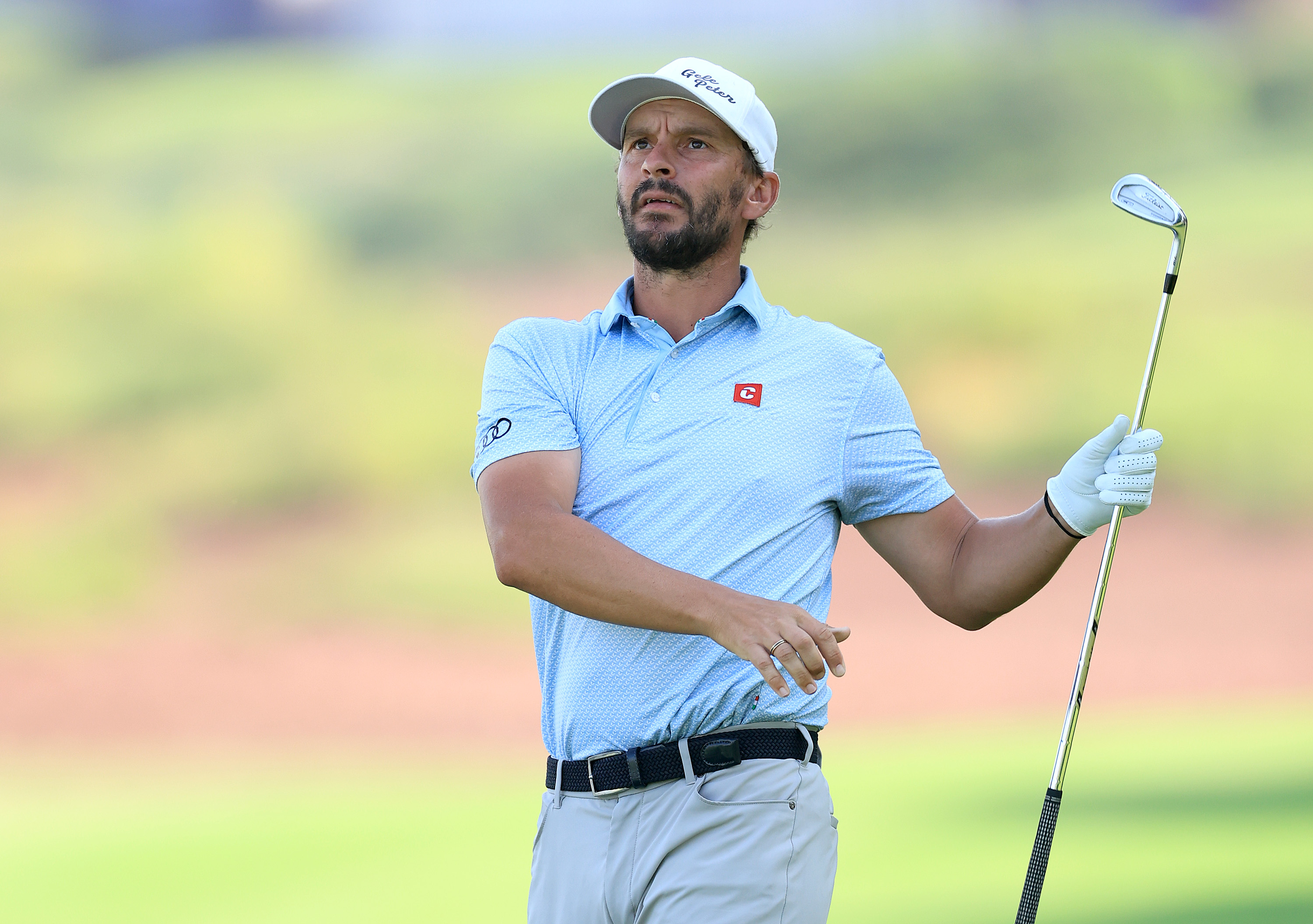 Joost Luiten watches an iron shot