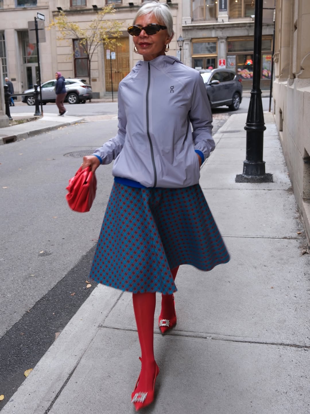 Grece Ghanem in red tights and crystal-adorned shoes.