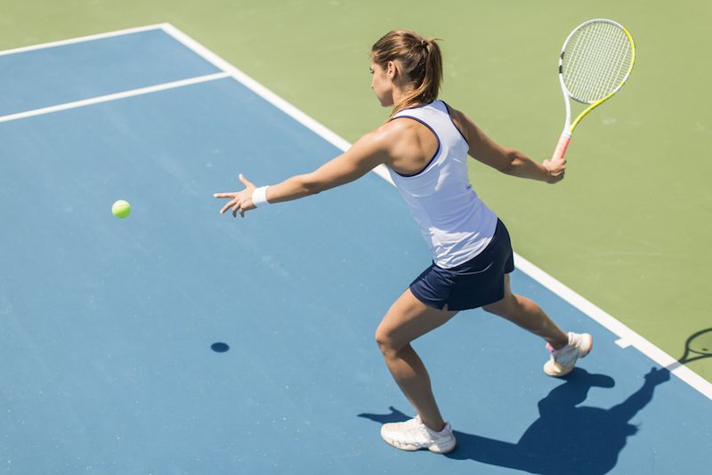 A woman plays tennis