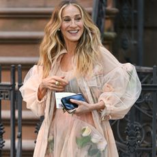 Sarah Jessica Parker wears a sheer Simone Rocha dress on set of and just like that in character as Carrie Bradshaw