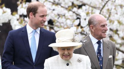 Queen Elizabeth II, Prince Philip, Duke of Edinburgh and Prince William, Duke of Cambridge attend the unveiling of the Windsor Greys Statue on March 31, 2014