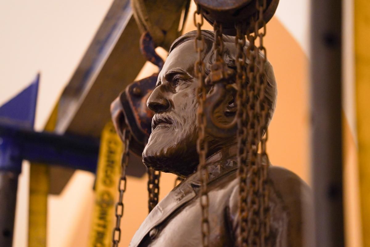 The statue of Robert E. Lee in the U.S. Capitol as it is removed from the building.