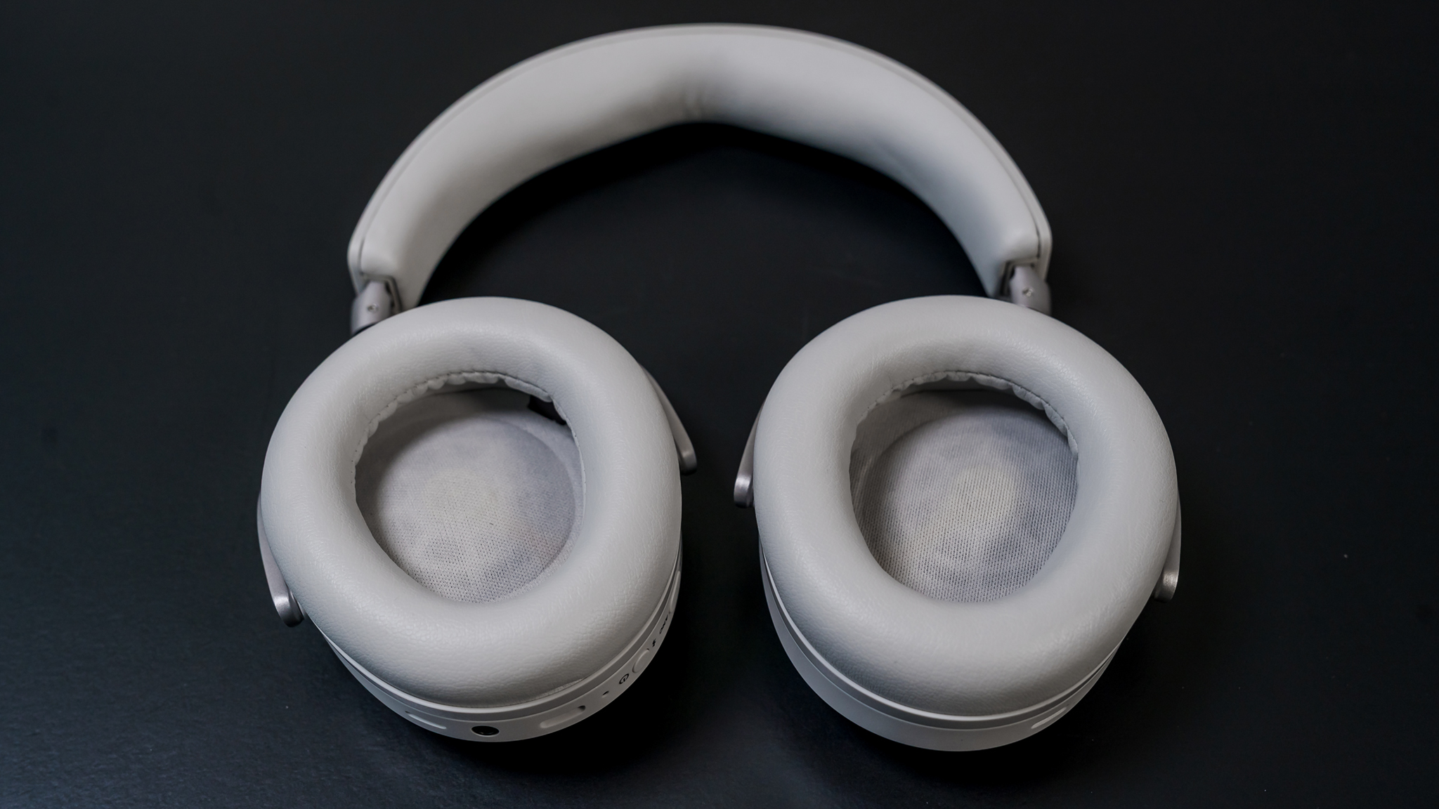 Beyerdynamic Aventho 300 headphones laying flat with ear cups up.