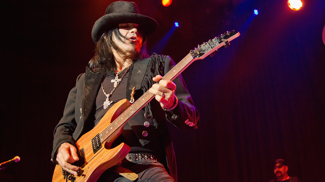 Robert Sarzo, performing onstage at The Fillmore in San Francisco, California on April 21, 2013