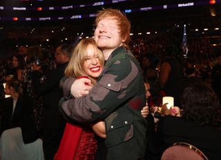 Kylie Minogue and Ed Sheeran pose at the 2024 Grammy Awards