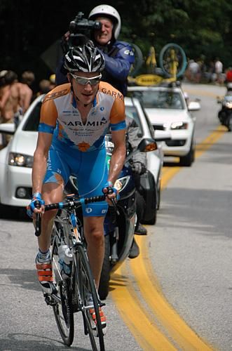 David Zabriskie (Garmin-Slipstream) is shadowed by the TV camera up Paris Mountain on the first full loop.