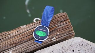 The Samsung Galaxy Watch 8 on the workout screen by the water.