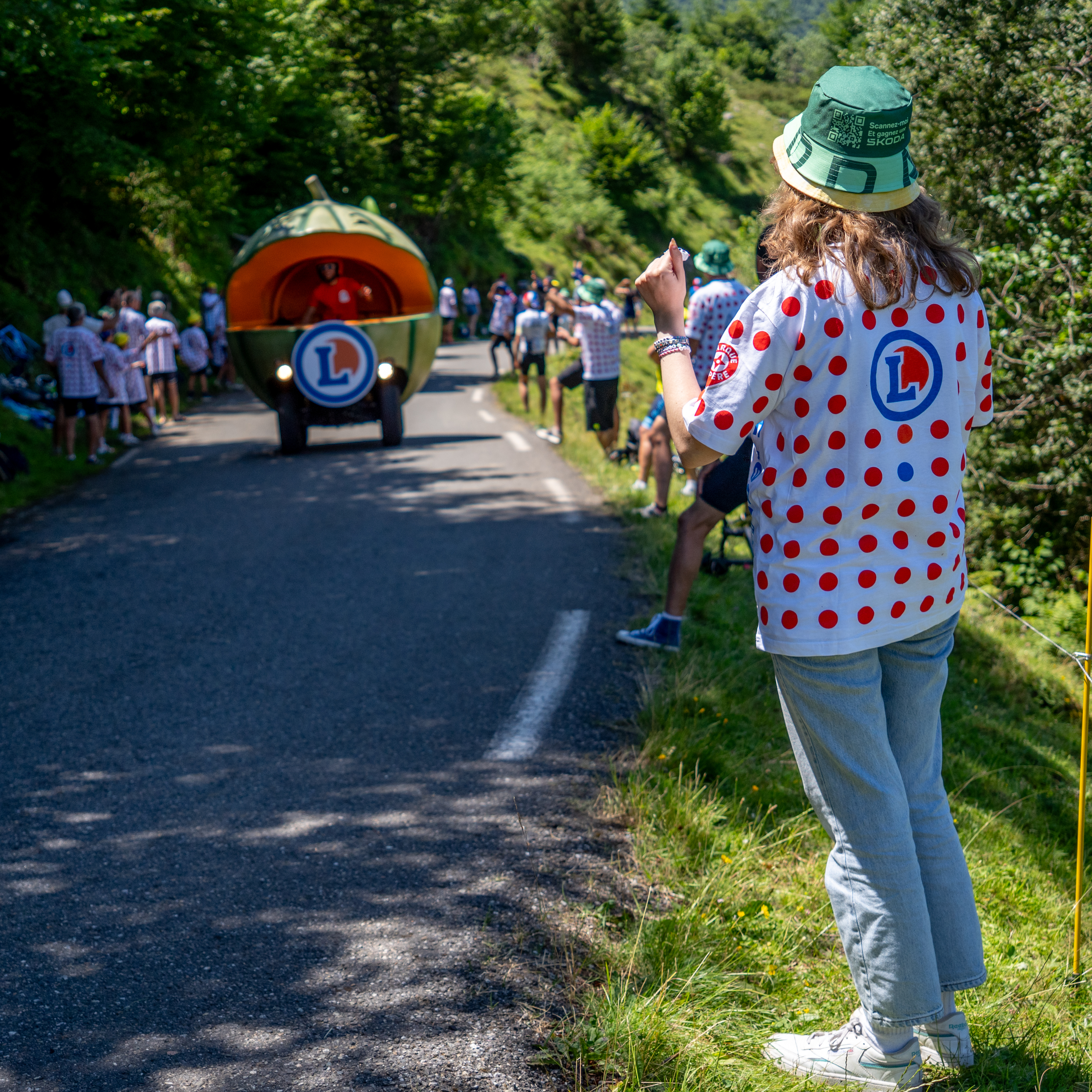The author wearing a polka-dot t-shirt at the side of the road at the Tour de France