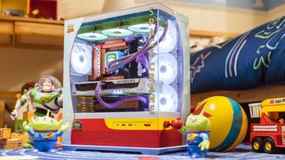 MSI's toy story gaming PC with buzz lightyear GPU and Woody Motherboard, in a kid's bedroom