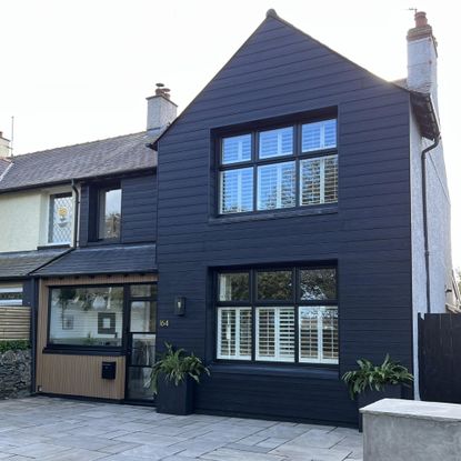 exterior of a house with dark grey cladding