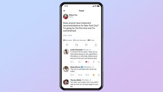 Image of Twitter timeline of phone with downvote button.