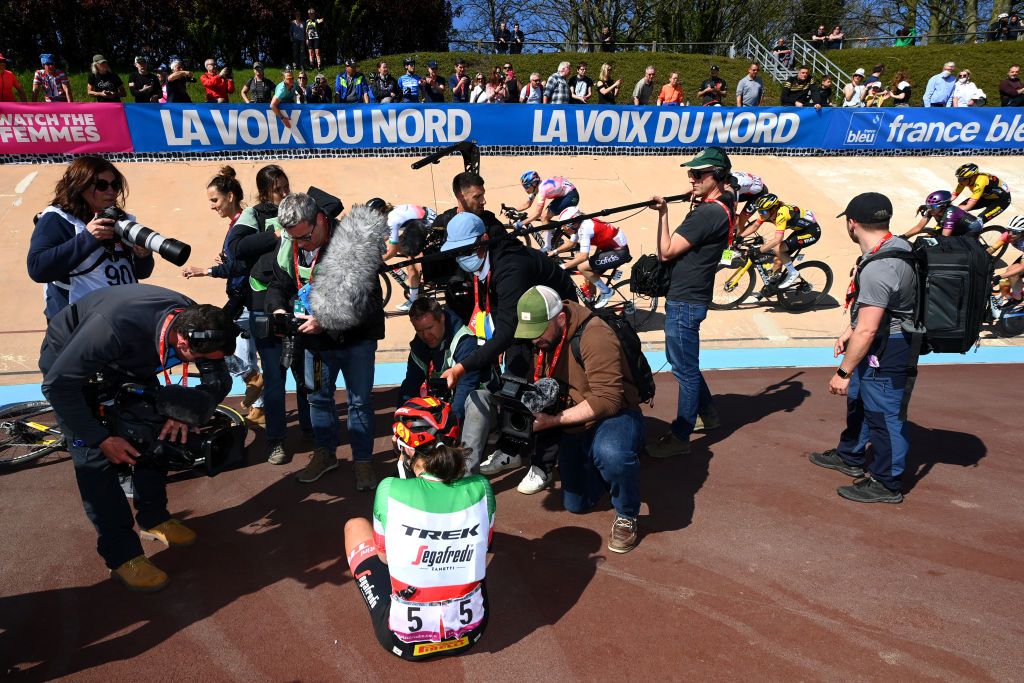 ROUBAIX FRANCE APRIL 16 Elisa Longo Borghini of Italy and Team Trek Segafredo celebrates winning surrounded by photographers in the Roubaix Velodrome Vlodrome Andr Ptrieux during the 2nd ParisRoubaix 2022 Womens Elite a 1247km one day race from Denain to Roubaix ParisRoubaixFemmes ParisRoubaix on April 16 2022 in Roubaix France Photo by Tim de WaeleGetty Images