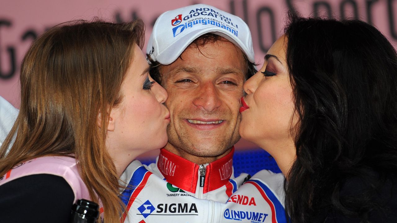 Michele Scarponi on the podium after winning his final Giro d'Italia stage