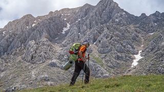 man hiking in mountains