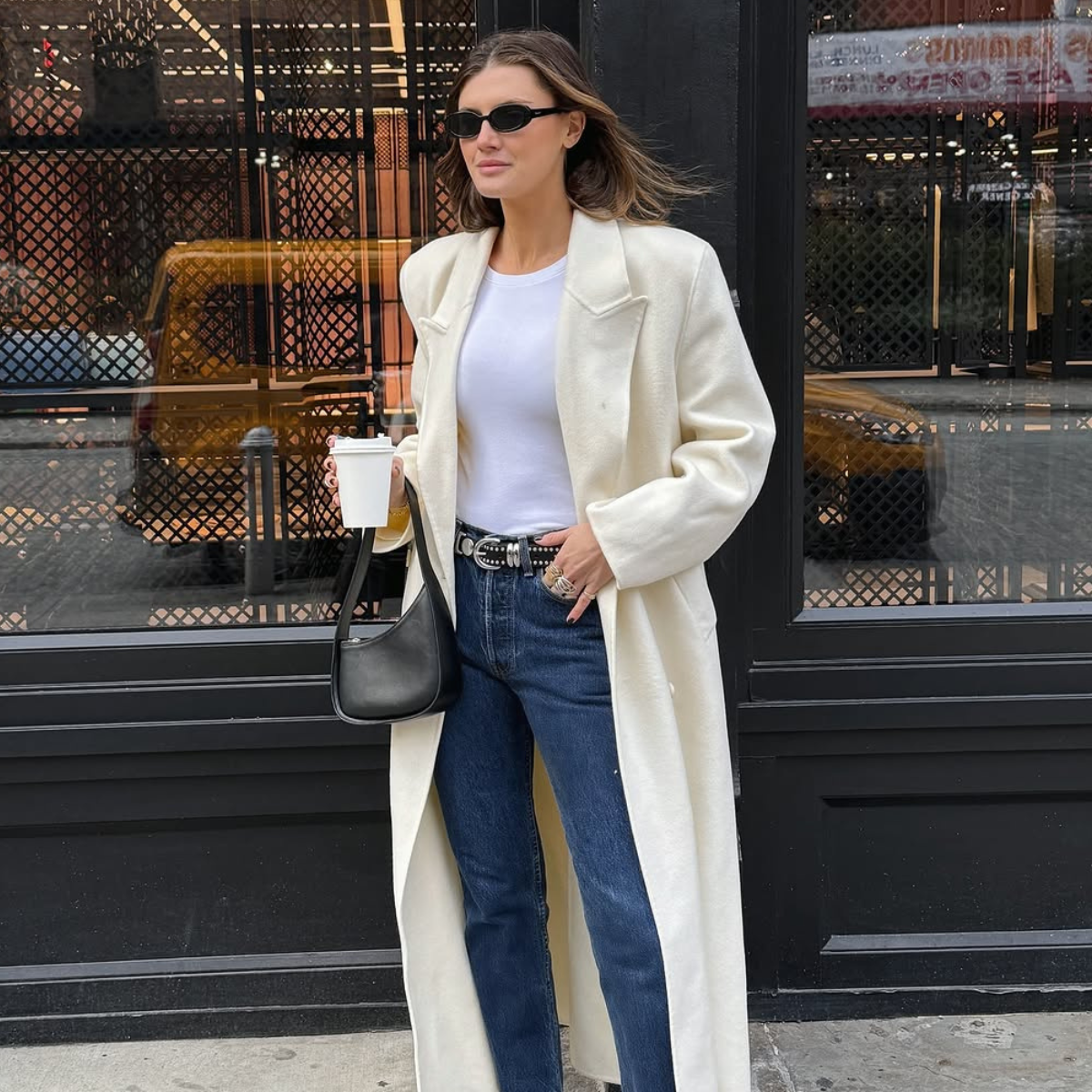 woman wearing winter to spring transitional capsule wardrobe 2026