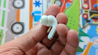 AirPods deals — AirPods Pro in hand