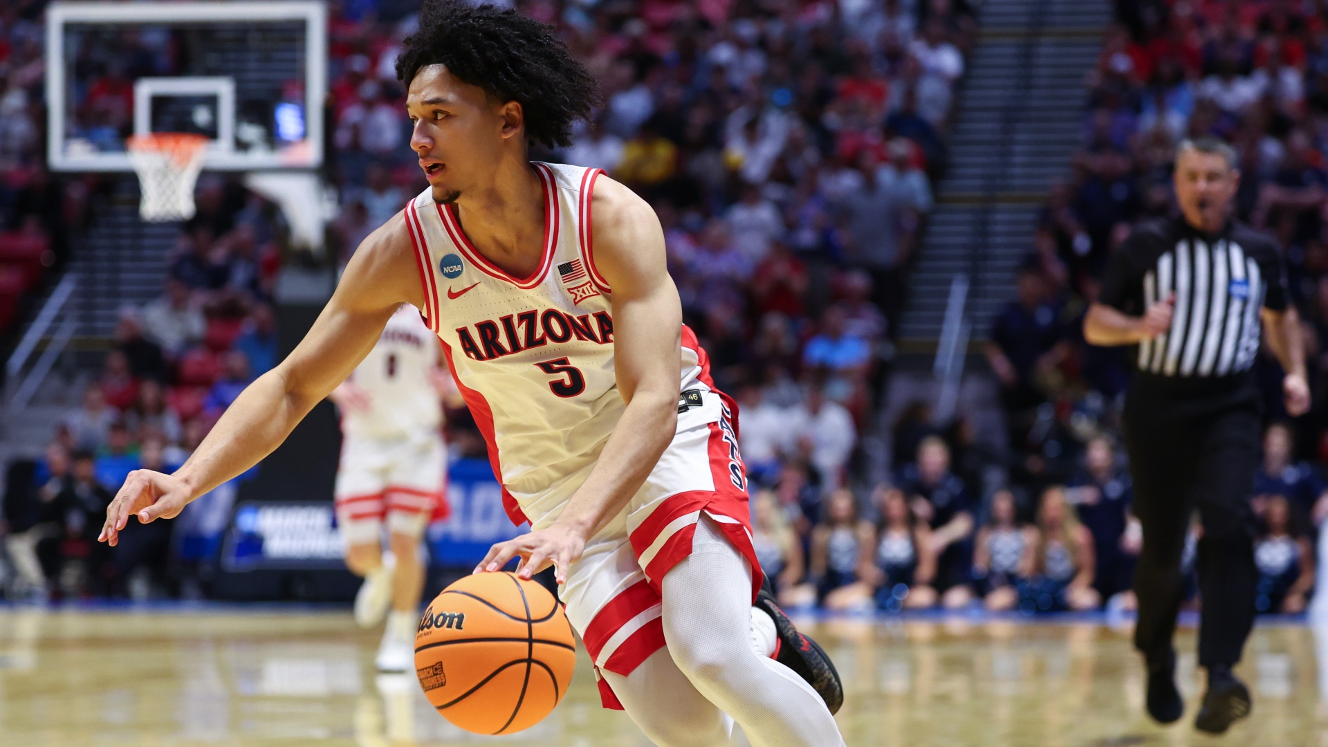 Brayden Burries of the Arizona Wildcats driving to the basket at March Madness 2026