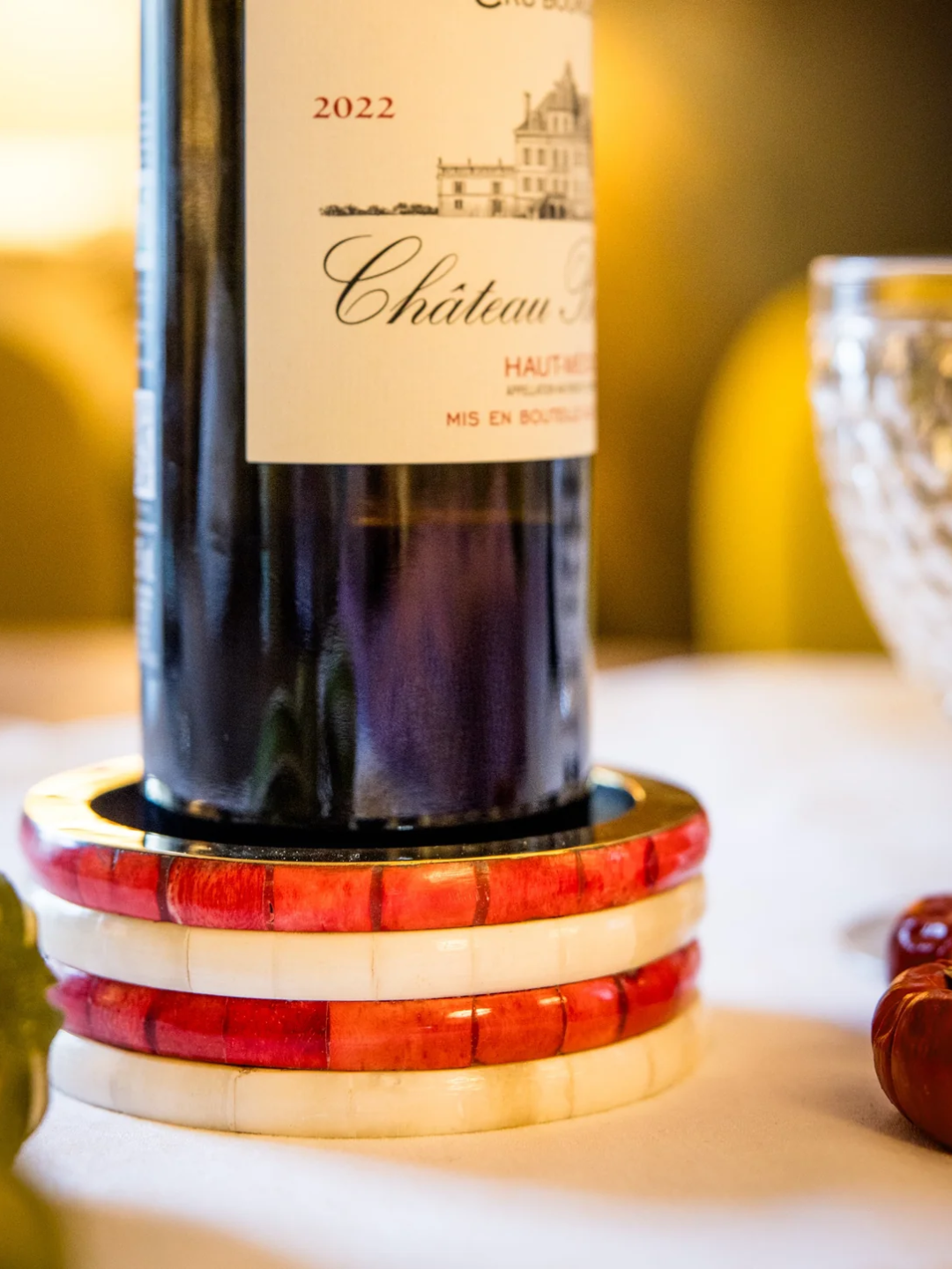 A red and white stacked wine coaster from Tooka