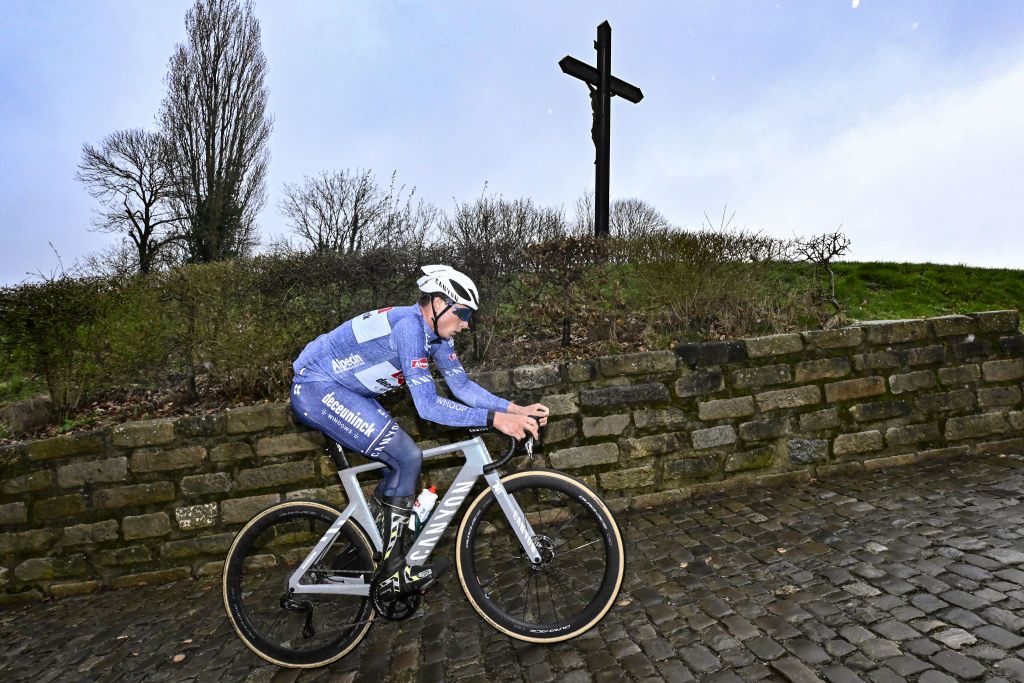 Alpecin-Deceuninck sprinter Jasper Philipsen on the Muur van Geraardsbergen during a recon of the Omloop Het Nieuwsblad route