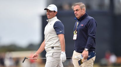 Rory McIlroy and Paul McGinley walk alongside each other
