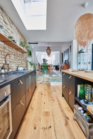 Lily Pickard house: kitchen with dark wooden painted units