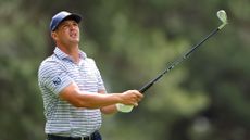 Bryson DeChambeau hits a shot during the first round of the 2024 Masters