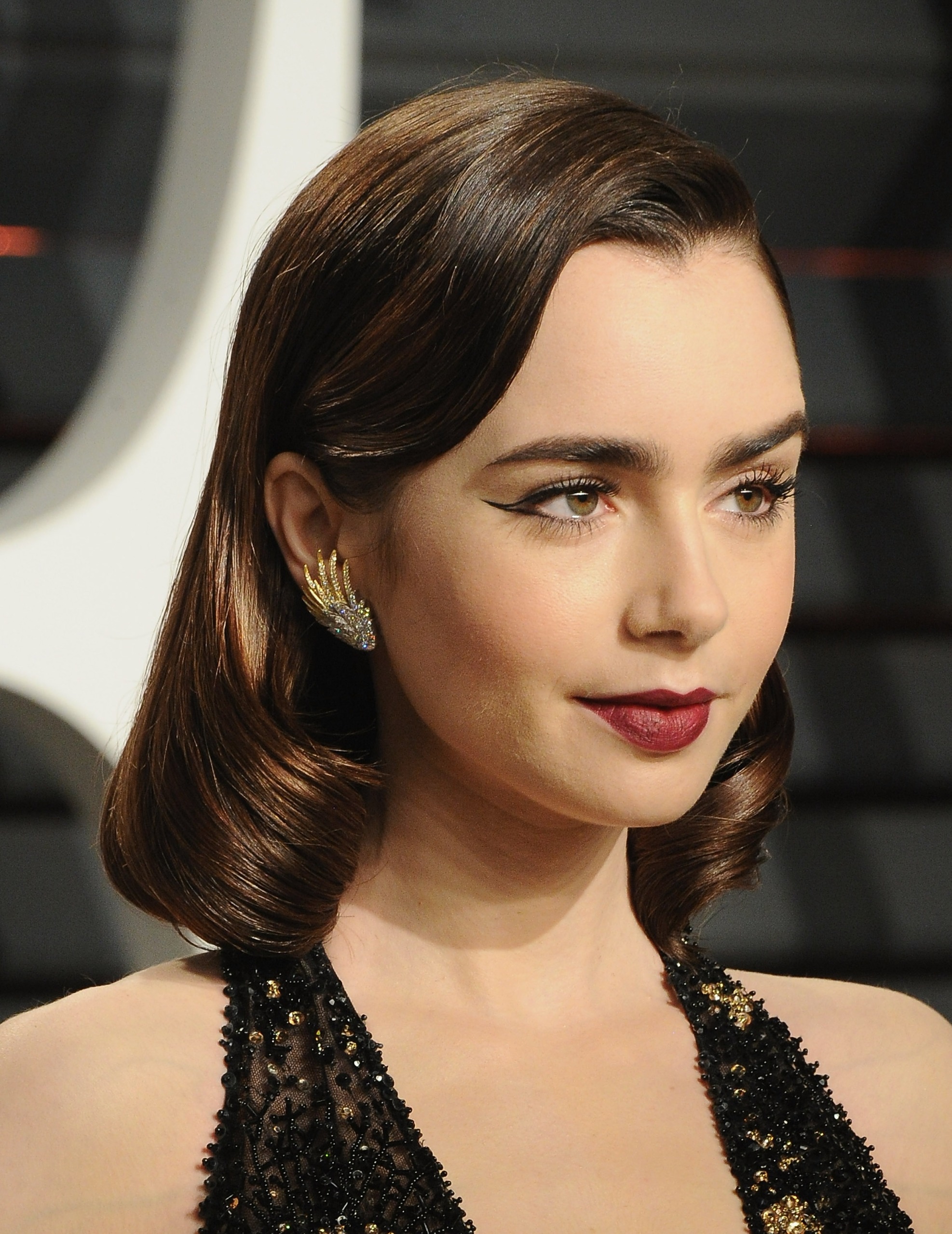 Actress Lily Collins arrives at the 2017 Vanity Fair Oscar Party Hosted By Graydon Carter at Wallis Annenberg Center for the Performing Arts on February 26, 2017 in Beverly Hills, California