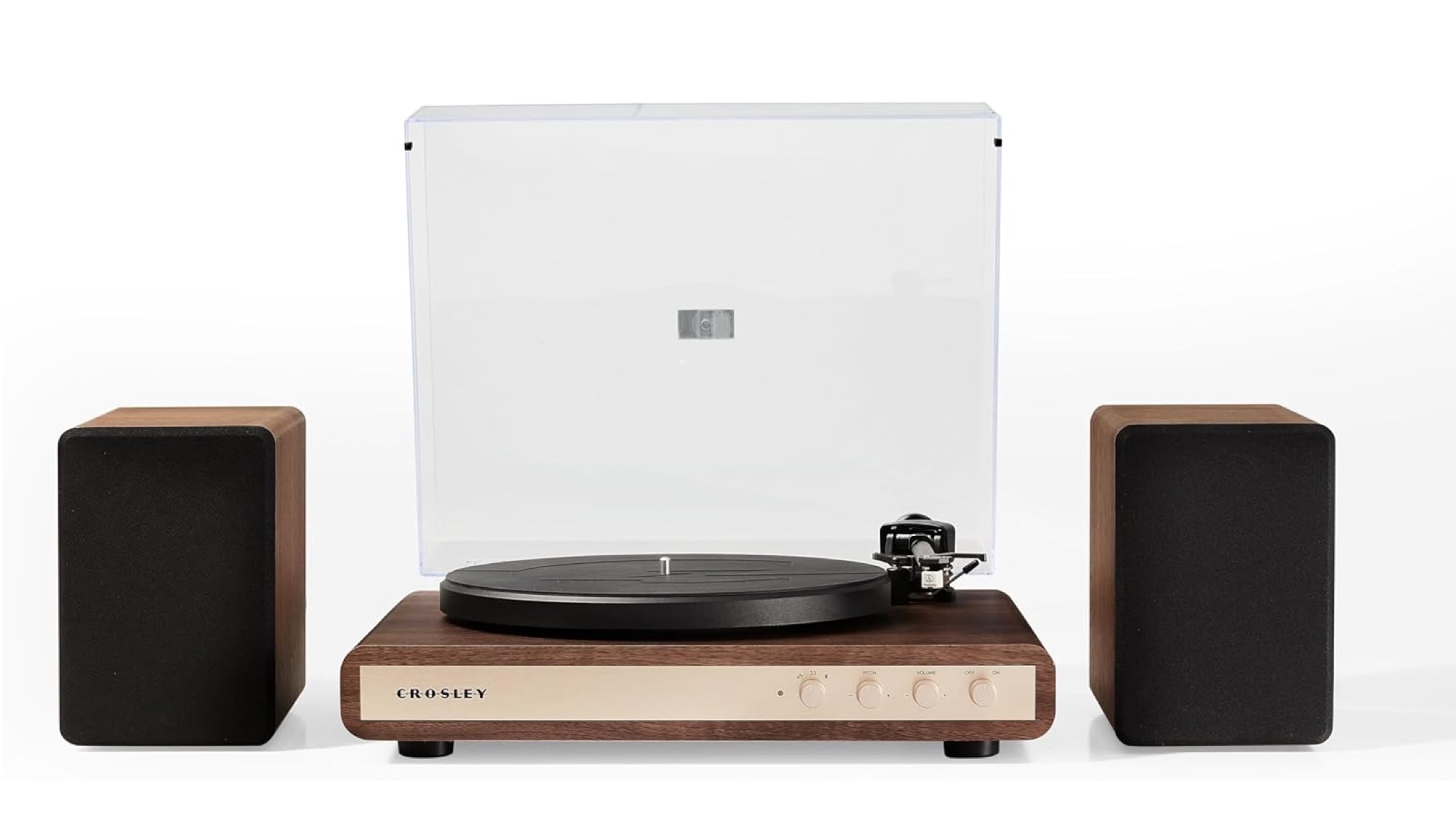 The Crosley C65 record player and speakers on a white background