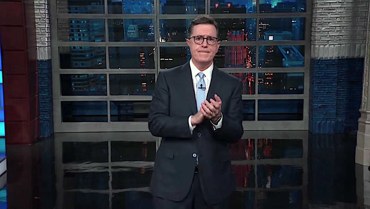 Stephen Colbert applauds the Parkland students